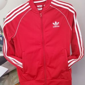 Red adidas track suit